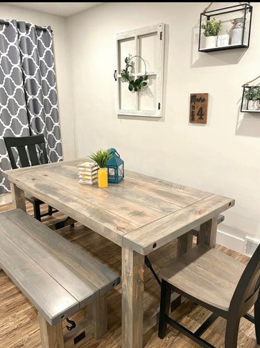 Wooden Whale Workshop turnbuckle dining table with connected post legs, showcasing a sturdy wooden tabletop and industrial-style design.
