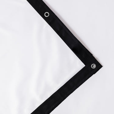 GolfBaysUSA Reversible PRO impact screen for golf simulators, showing a durable, high-quality impact surface with a green background.