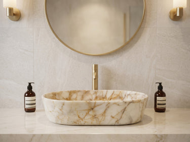 Luvohome Calacatta Gold marble oval above-vanity vessel sink with curved design, polished finish, 16-inch width, 24-inch length.