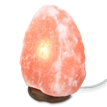 Himalayan salt lamp from Black Tai Salt Co. weighs 11-14.5 lbs, featuring a warm, glowing orange glow and natural salt crystal appearance.