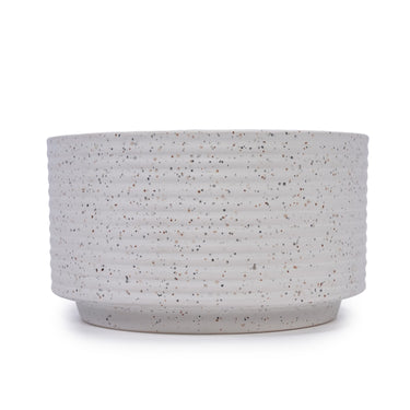Two milk white ceramic flowerpots from HouseOfZazla, showcasing smooth, rounded design perfect for indoor plants.