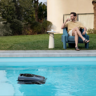 Beatbot AquaSense 2 Ultra robotic pool cleaner in action, showcasing its sleek design and cleaning brushes for efficient pool maintenance.