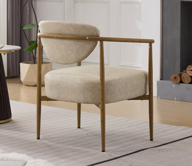 Beige PU leather HouseOfZazla dining room chair with metal frame, showcasing modern design and cushioned seat.