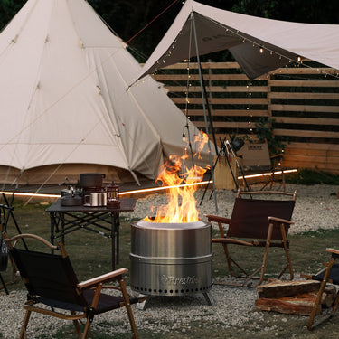 TURBRO Pluto R19-SS smokeless outdoor fire pit in stainless steel with a round design and metal legs, suitable for patio use.