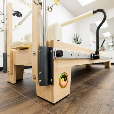 Personal Hour Nano Elite Half Trapeze Pilates reformer with adjustable tower, compact studio Pilates machine for versatile workouts.