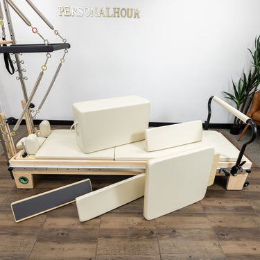 Personal Hour Nano Elite Half Trapeze Pilates Reformer with adjustable tower in a studio setting