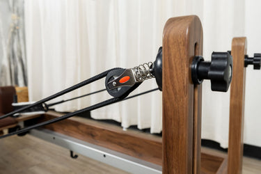 Nano La Force Plus premium walnut studio reformer Pilates machine by Personal Hour with adjustable resistance and sleek design.
