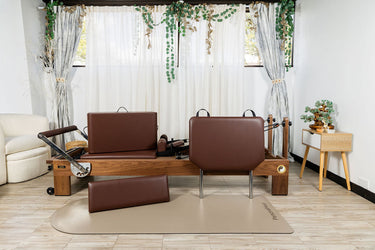 Nano La Force Plus premium walnut studio reformer Pilates machine by Personal Hour, with sleek design and professional-grade features.