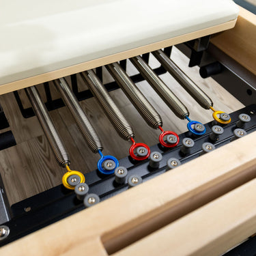 Personal Hour Nano Elite Half Trapeze Pilates Reformer with adjustable tower for studio fitness and reformer exercises.