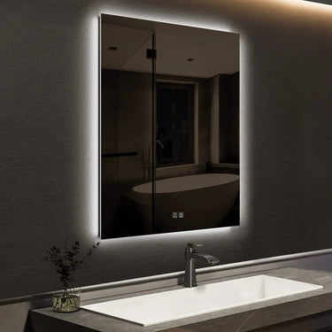 Sleek backlit LED bathroom mirror by HAUSVITA with a compact design and modern frame, illuminated for clear reflection.