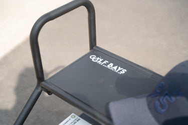 GolfBays USA Dual Bag Display Storage Organizer for golf clubs, with multiple compartments and a sturdy frame.