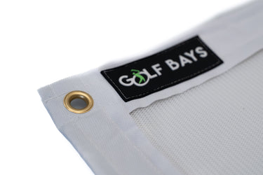 Impact screen with foam layer backing from GolfbaysUSA, showing a durable, high-quality golf training screen with reinforced edges.