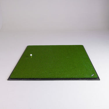 GolfbaysUSA golf hitting mat with tee insert, 4'11" x 4'11" for indoor or outdoor practice, durable synthetic turf surface.