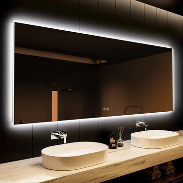 Deluxe sleek backlit LED bathroom mirror by HAUSVITA with modern design and illuminated frame, reflecting a stylish bathroom setting.