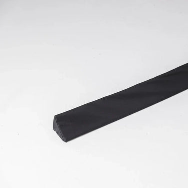 Foam triangle wedge protection pelmet for home safety, designed by GolfbaysUSA, showing soft foam with a triangular shape for impact absorption.