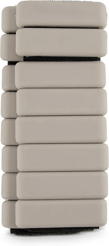 Adjustable weighted Pilates bangles from Personal Hour for yoga and Pilates, shown on ankles and wrists for added resistance.