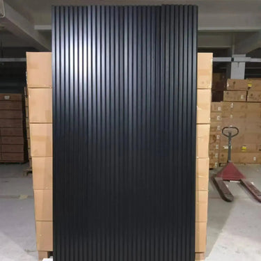 Black acoustic solid wood wall panels by HAUSVITA, showcasing two elegant panels for interior decor and soundproofing.