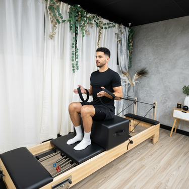 Large Nano Elite Plus Pilates Reformer by Personal Hour, a professional-grade studio Pilates machine with adjustable features.