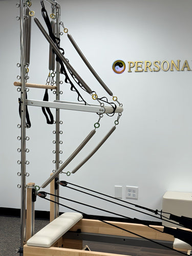 PersonalHour NanoElitePlus Tower Pilates springs for resistance training, showcasing the set of adjustable Pilates springs in a compact form.