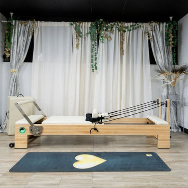 Large Nano Elite Plus Pilates Reformer by Personal Hour, premium studio Pilates machine with adjustable features and padded surfaces.