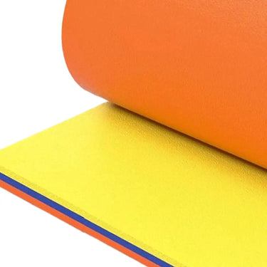 Oversized outdoor foam lounge mat by 24 Hour Sport, ideal for water relaxation and outdoor lounging on soft, cushioned surface.