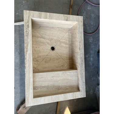 Handcrafted custom travertine kitchen sink by Luvohome, featuring a natural stone finish and elegant design.