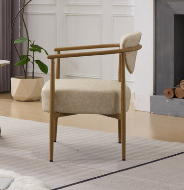 Beige PU leather dining chair with metal frame by HouseOfZazla, showcasing a modern, upholstered seat and sleek metal legs.