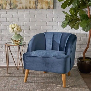 Modern HouseOfZazla accent armchair with plush fabric, curved armrests, and a sleek design perfect for reading and relaxing.