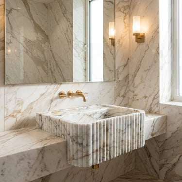 Luvohome Calacatta Gold marble wall-mount bathroom vanity sink with fluted design, 18-inch wide and 36-inch long stone sink.