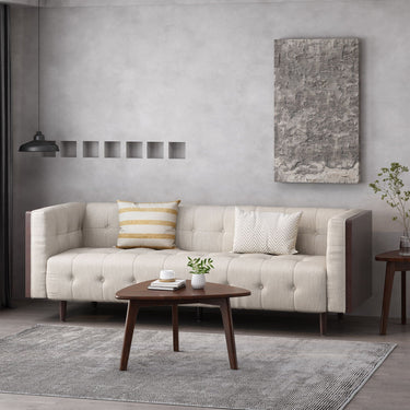 Contemporary Mid-Century Charm 3-seater sofa by HouseOfZazla featuring button tufted waffle stitching and sleek stationary design.