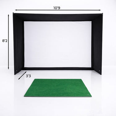 GolfBays EasySim golf simulator enclosure showing a spacious indoor golf hitting area with netting and protective walls.