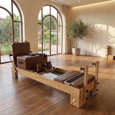 Nano Pro Max Studio Pilates Reformer by Personal Hour showing the compact Pilates machine with adjustable resistance and reformer carriage.