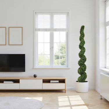 Seven-foot artificial spiral topiary trees from HouseOfZazla, outdoor faux boxwood plants with lush green foliage.