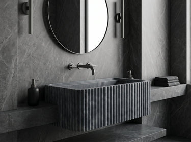 Blue stone marble wall-mount bathroom sink with a rectangular fluted design, 24 inches long and 16 inches wide, by Luvohome.