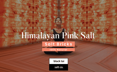 Black Tai Salt Co. Himalayan Salt Sauna room, 4'x4' surface area with 16 sq ft, showcasing salt walls and interior design.