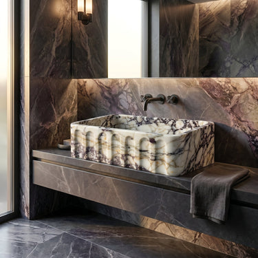 Natural Calacatta Viola marble wall-mount bathroom vanity sink with fluted front, 19.5-inch wide and 31.5-inch long by Luvohome.