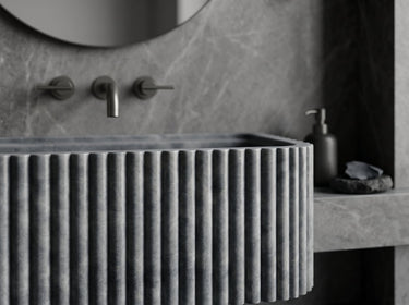 Luvohome blue stone rectangular wall-mounted bathroom sink with fluted design, measuring 24 inches long, 16 inches wide, and 12 inches high.