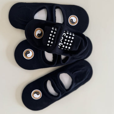 PersonalHour Pilates and Yoga Socks, with grip soles, in black and pink, designed for stability and comfort during yoga and Pilates sessions.